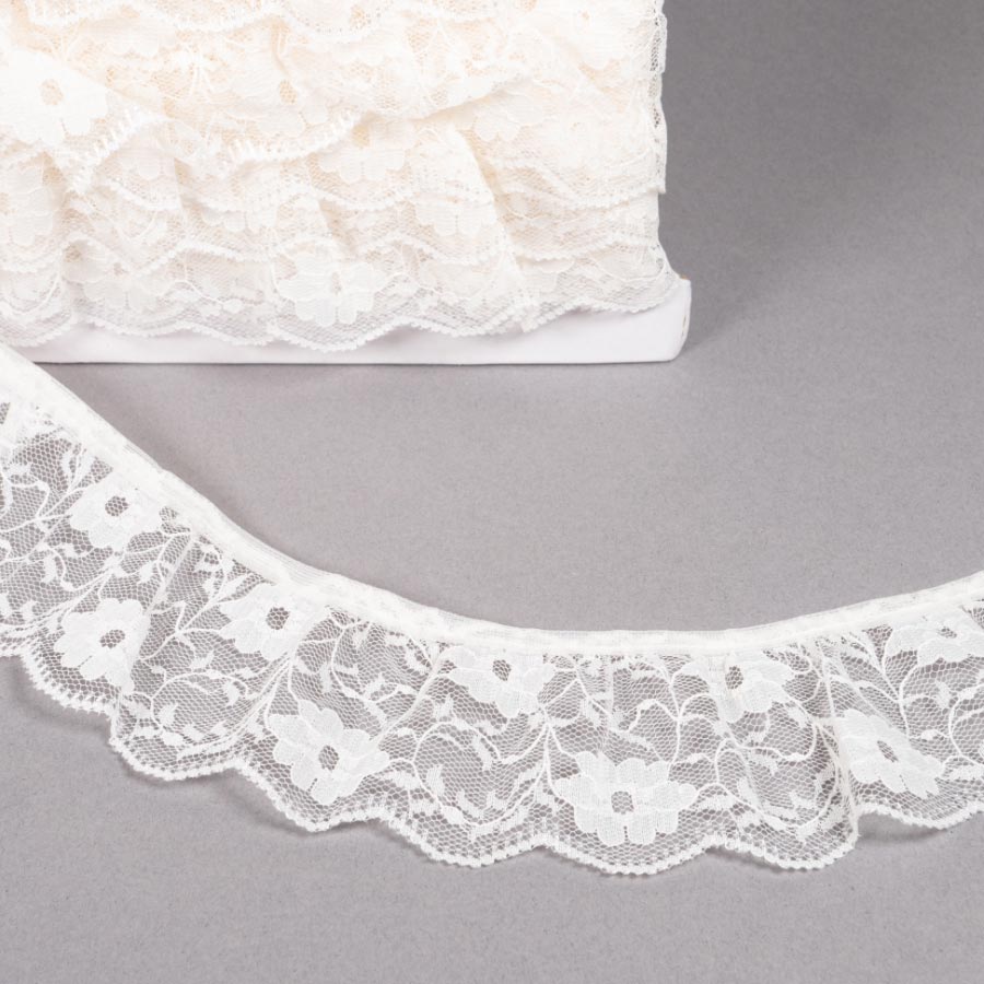 55MM FRILLED LACE 12.5M CREAM