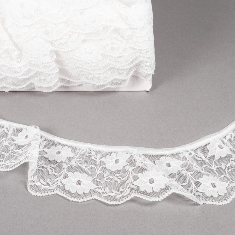 55MM FRILLED LACE 12.5M WHITE